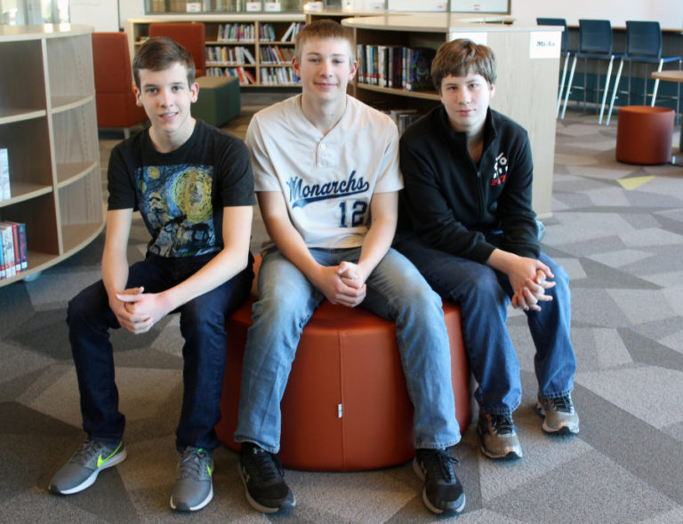 Students from one of the three teams selected to take part in a Dec. 15, 2018, competition at Mercy Corps in Portland include (from left to right): Joseph Jacobson, Evan Fish and Colin Carroll.