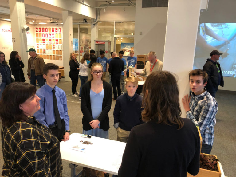 Discovery High students explain their inventions for sustainable farming to judges at the Camas high school on Dec. 7, 2018.