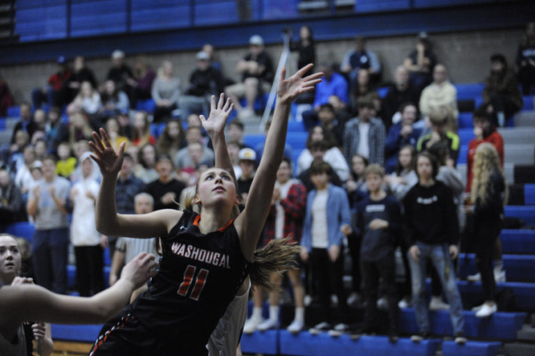 Washougal junior McKinley Stotts dominates in the paint, leading all scorers with 21 points in a Jan.