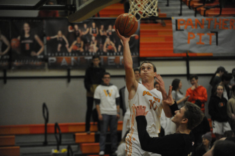 Washougal forward Dalton Payne challenges the Lumberjack defense in front of a home crowd.