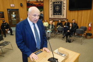 Mike Hansen, a parishioner at St. Thomas Aquinas Catholic Church, in Camas, provides an invocation before the start of the Washougal City Council meeting Monday, Jan. 28. Several City Council members want to reconsider a 2014 council vote that allows invocations to occur just before the council meetings. 