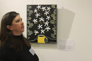 Camas artist Jennifer Neal talks about her coffee-inspired art at an artist reception in her honor, held Dec. 7, at the Second Story Gallery in downtown Camas. 