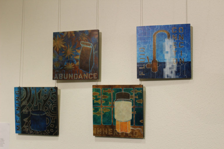 A series of coffee-inspired paintings by Camas artist Jennifer Neal hang inside the Second Story Gallery in downtown Camas.