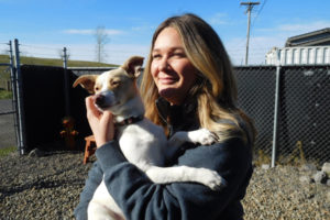 Amanda Prince, of Washougal, spends time with Jerzey, a shelter dog at the West Columbia Gorge Humane Society (WCGHS) in Washougal. Prince is a foster volunteer who provides a temporary home for dogs until they are adopted. Jerzey was adopted on Feb. 4.