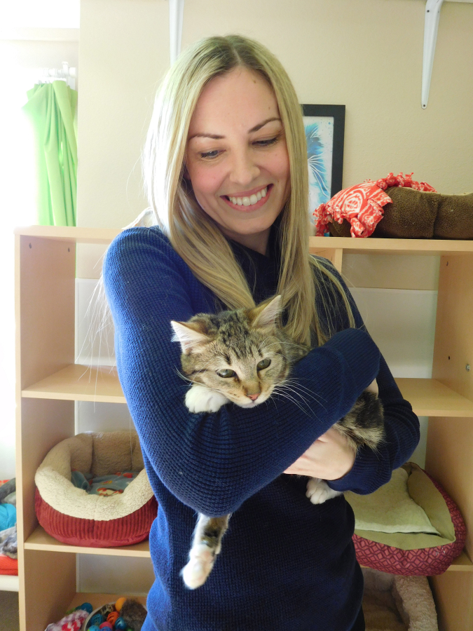 Jessica Kaady, of Washougal, holds Keanu, one of the kittens available to adopt at the West Columbia Gorge Humane Society, in Washougal. Kaady and her two children have provided foster care for 20 kittens during the past year.