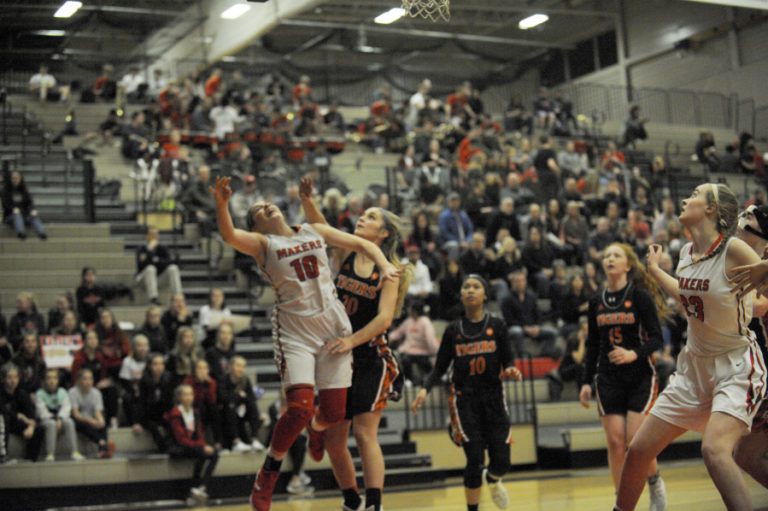 Camas sophomore Katelynn Forner is fouled as she makes a nice move to the basket against the Battle Ground Tigers on Jan.