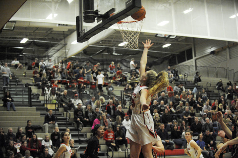 Haley Hanson makes another easy layup as the Papermakers win another league title on Jan. 30, with a win over Battle Ground.