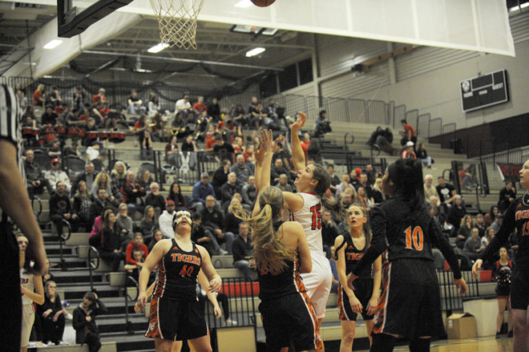 Camas senior Katie Hancock makes a strong move inside as the Papermakers wallop the Battle Ground Tigers to share the 4A league championship with Union.