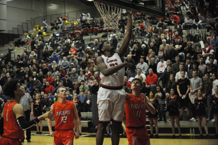 Camas forward Isaiah Sampson glides down the line for an easy basket, to tie the game against Battle Ground on Jan. 30.