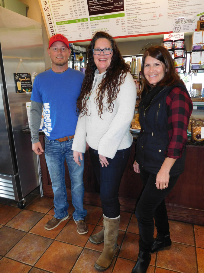 Jeramy Wilcox, Amber Owens and Marcie Wilcox meet at Squeeze and Grind, in downtown Camas on Friday, Feb. 8.