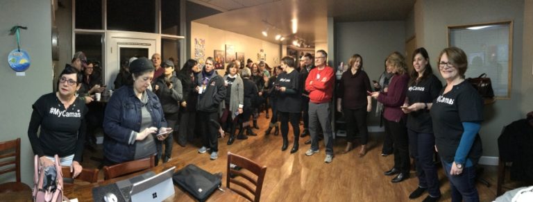 A group gathers inside Caffe Piccolo in Camas at 5:30 a.m., Tuesday, Feb.