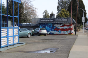 The view of Limitless America, a gun shop in Washougal, from the northeast corner of "E" and 25th streets, near the edge of a playground bordering Hathaway
Elementary School. The gun shop is hosting a rally to build support for a local ordinance that would make it illegal for local officials to enforce new gun-safety laws passed by a majority of Clark County and Camas-Washougal voters in the November 2018 midterm elections. 