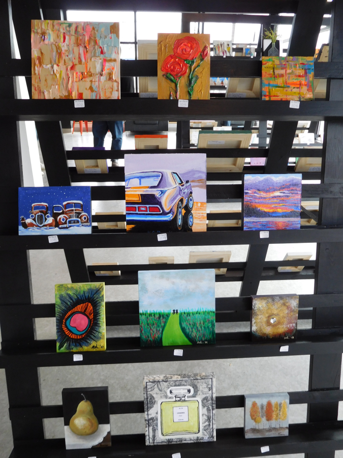 The subjects of the ‘Little Art Camas’ paintings, by artists age 9 and older, include flowers, cars and sunsets, as well as beaches and pets.