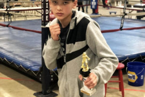 Boxer Ben Schluter from Camas picks up another piece of hardware after winning the Silver Gloves Regional Boxing Tournament in Boise, Idaho. The win gave him the honor of competing at the National Tournament in Missouri, where he finished in fifth place. 