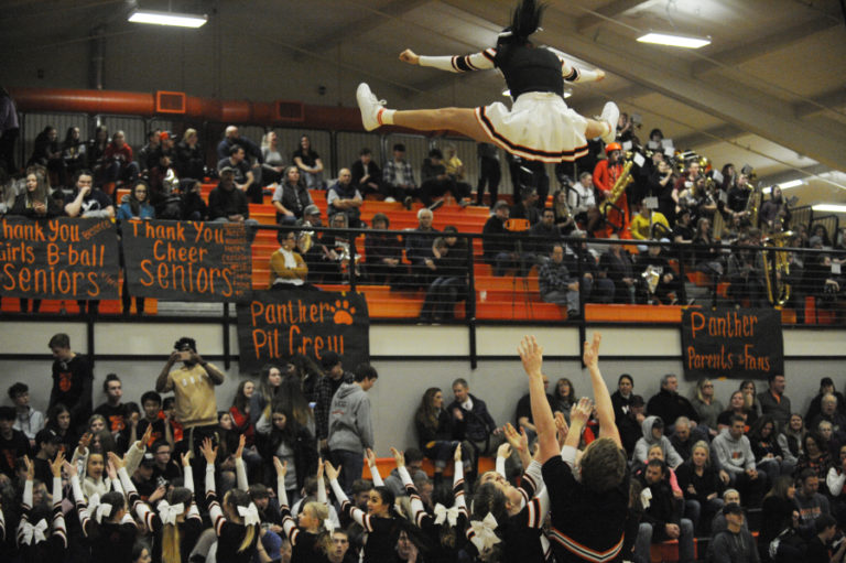 Washougal cheerleaders keep the Panther crowd fired up during a timeout in the first playoff game of the season.