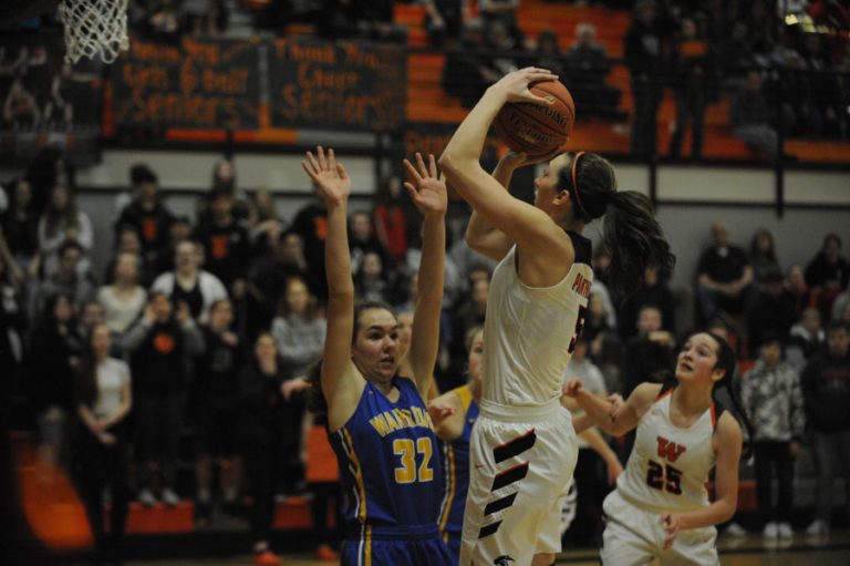 Beyonce Bea hits a clutch shot to secure a Washougal victory in the opening playoff game against Rochester on the Panthers&#039; home floor.