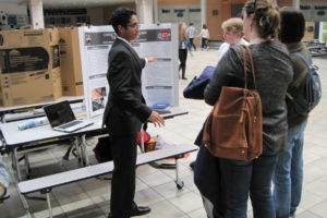 Camas High School students Akash Prasad (left) and Jacob Leetham (right) talk about their project during the Southwest Washington Science and Engineering Fair, held Saturday, March 2, at Skyview High School in Vancouver. 