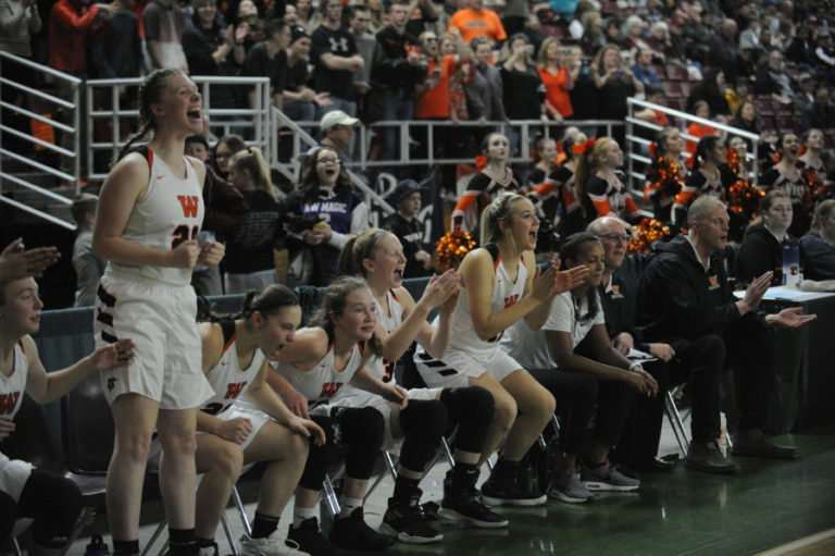 The Panther bench erupts during the overtime period in the state championship title game as Beyonce Bea makes another free throw.