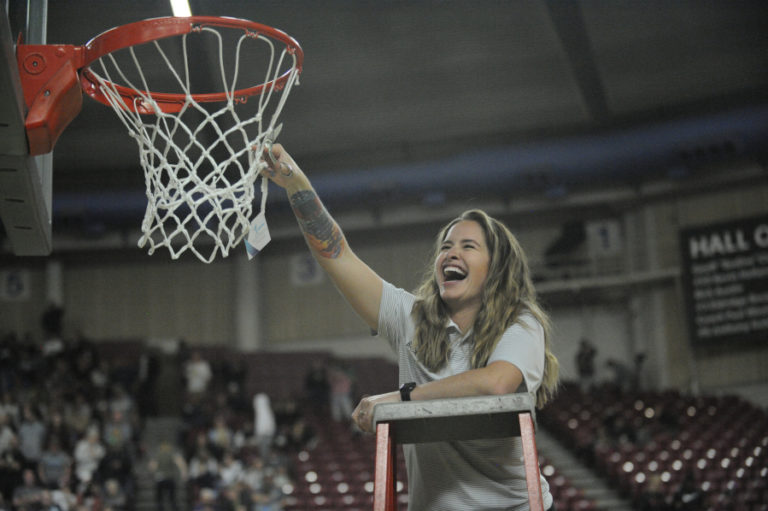 Head coach Brittney Knotts is all smiles after her team beat East Valley to win the 2A state championship.
