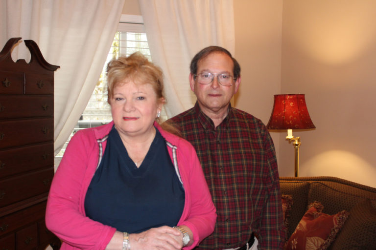 Ireland Greens Adult Family Home owners Brenda and Richard Davis stand inside one of the private rooms at their care facility, now accepting five new senior or medically compromised residents.