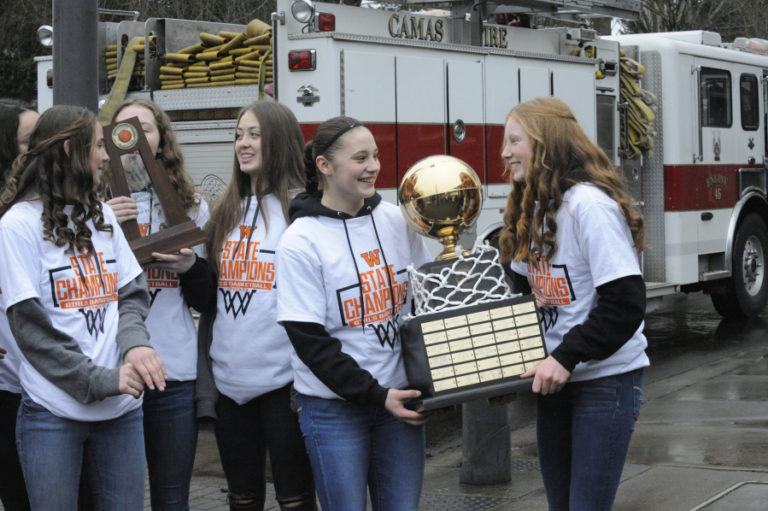 The Washougal girls bring the state championship trophy into downtown Washougal for a celebration on Friday, March 8.
