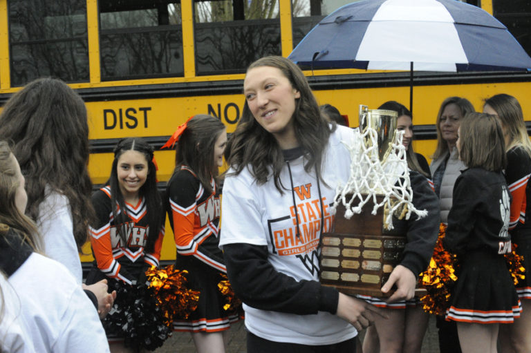 Standing in the cold rain doesn&#039;t feel bad when you have a state championship trophy to warm you up.