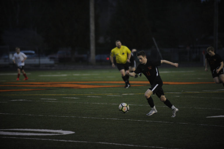Washougal freshman Mason VanNostern leads a fast break towards the goal during a March 14 game.