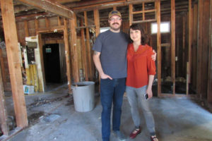 Chuck and Janessa Stoltz stand inside their future Acorn and the Oak business, at the former site of the Lakeside Chalet in Camas. (Tina Sillers/For the Post-Record)