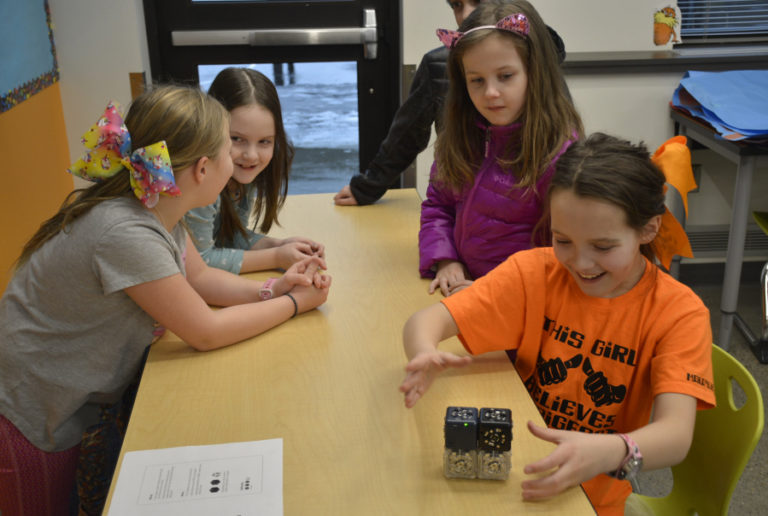 Columbia River Gorge Elementary School students Darrian Ellsworth, Elsa Purcell, Scarlett Seifert  and Mckaylie Van Delden work on a &#039;cubelets&#039; project during a coding club session last month.