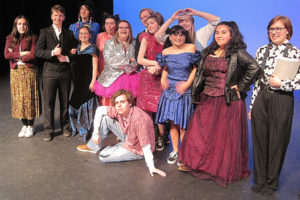 The cast of the Washougal High School advanced acting class production of "The Awesome '80s Prom" strikes a post at the school theater on April 11.
