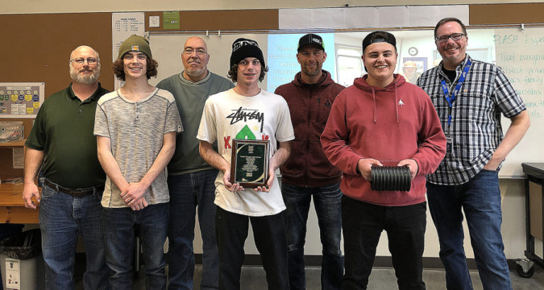 From left to right, Howard Hawk, Eli Lawrence, Dave Young, Mitch McKowan, Jay Christ, Maxwell Fassett and Kelly Johnson pose for a photo on March 12 at Hayes Freedom High School. Lawrence, McKowan and Fassett had just completed the end of their internship at Advanced Drainage Systems in Washougal, where Hawk, Young and Christ work. Johnson is a career technical education teacher at Hayes Freedom.