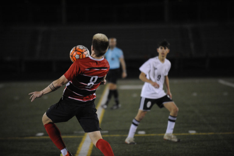 Senior Tybalt Thornberry controls the ball at midfield for the Papermakers in a 1-1 tie against Union at Doc Harris Stadium on April 17.