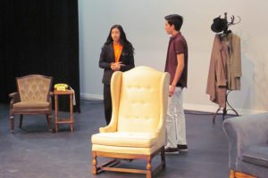 Washougal High School students Emmy Campen (left) and Shane Fussell rehearse a scene from "The Mousetrap" at the school's theater on April 26. 