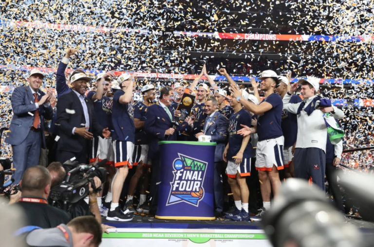 2001 Washougal graduate Ronnie Wideman (far left) celebrates the national championship with his University of Virginia Cavaliers men&#039;s basketball team on April 8.