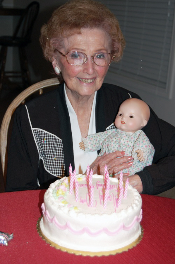 Marian Tuttle-Crum holds a doll she received as a gift on her 10th birthday in 1929, at her 90th birthday party in 2009. Marian, of Camas, will turn 100 on Friday, May 10, and will celebrate with her family over Mother&#039;s Day weekend.
