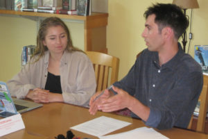 Camas High School senior Rachel Blair (left), co-founder of TEDxYouth@Camas, talks with speaker Adam Lewis during a workshop May 11 at Camas Public Library. 