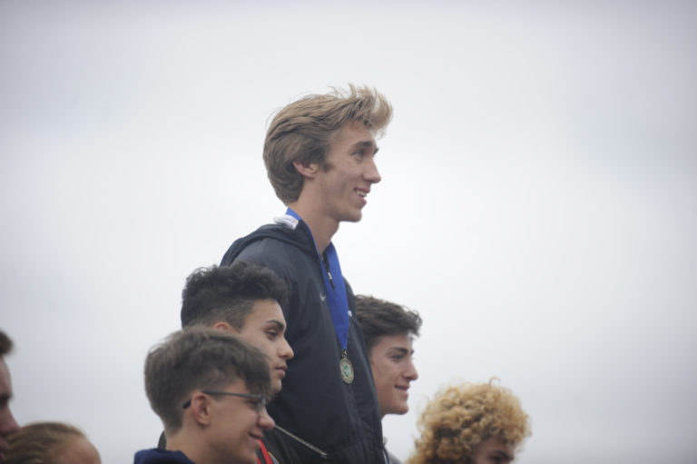 The top of the podium is a familiar place for Camas senior Daniel Maton, pictured above receiving a medal for his first-place performance in the 800-meter run at the 4A state track and field meet in Tacoma.