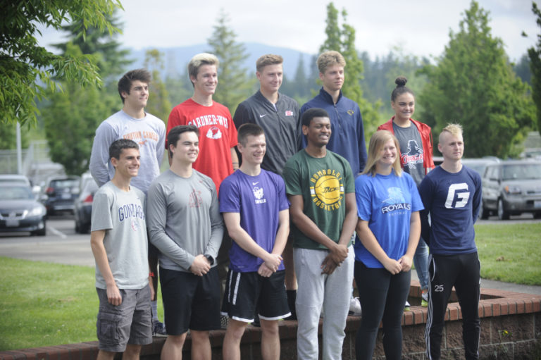 Camas High School letter-of-intent signees pose for pictures at a signing ceremony at the high school on May 29.