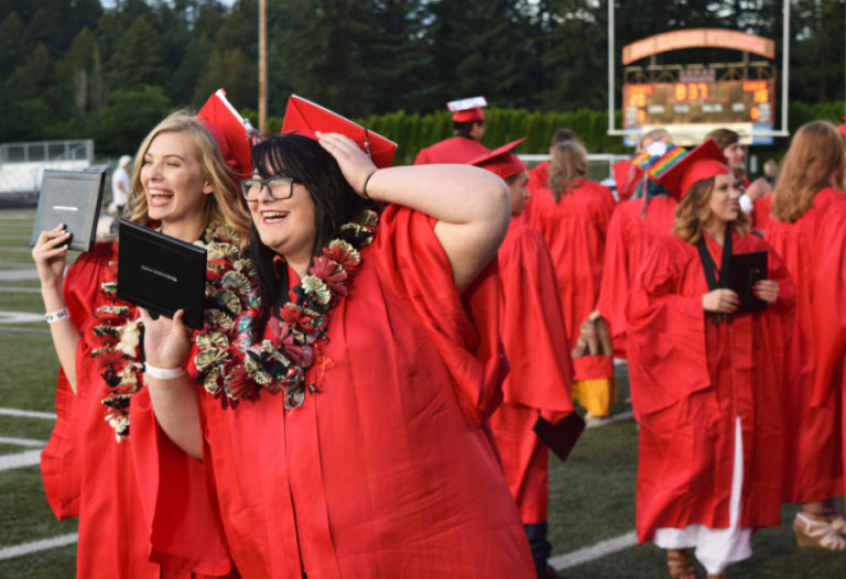 Camas High School class of 2018 graduates decorated their graduation caps with inspirational quotes and future college logos.