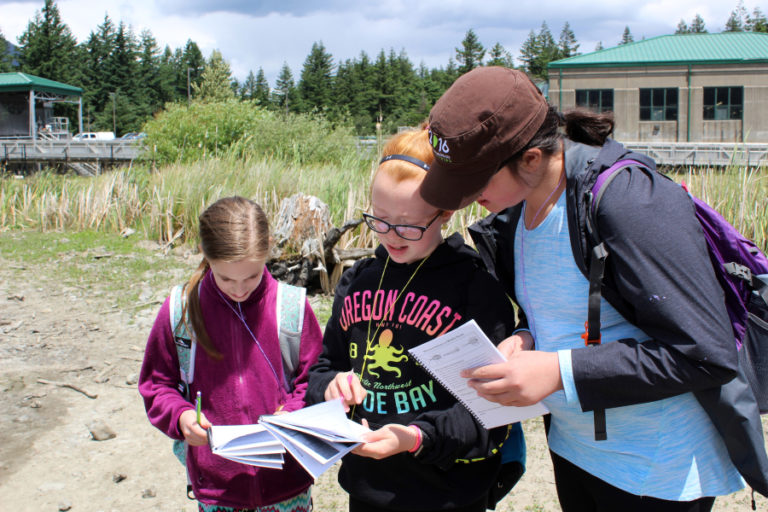 Jemtegaard students (from left to right) Brooklyne Lowe, Aubrey Hettling and Kate Kesler attend outdoor school on June 6.