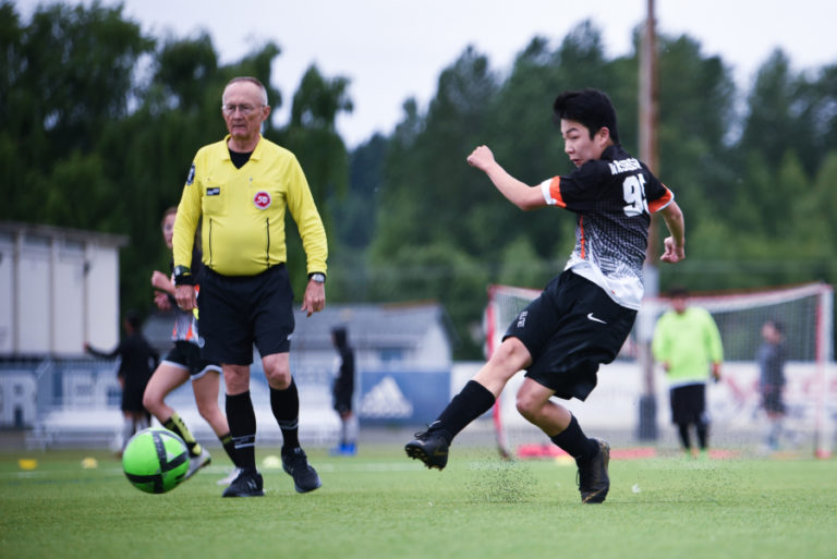 Washougal&#039;s Caleb Graham powers a shot at the goal during the Unified Soccer State Championship tournament in Sumner on May 25.