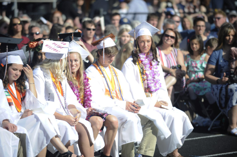 Honors students, including valedictorians Paige Wilson (second from left), Amelia Pullen (third from left), Ryan Davy (second from right) and Beyonce Bea (right), attend Washougal High&#039;s class of 2019 graduation ceremony on Saturday, June 8. (Photos by Wayne Havrelly/Post-Record)