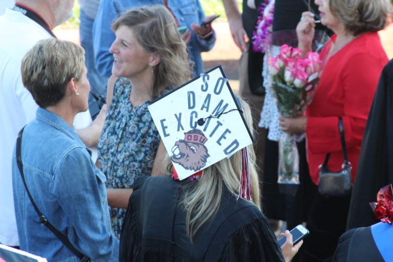 (Photo by Kelly Moyer/Post-Record)
A Camas High School class of 2019 graduate shows off the next chapter of her education, as an Oregon State University Beaver, at their June 14 graduation ceremony, held at Doc Harris Stadium in Camas. 
