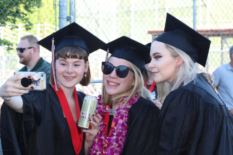 (Photo by Kelly Moyer/Post-Record)
Camas High School class of 2019 graduates take a quick selfie photo before their graduation ceremony on June 14.