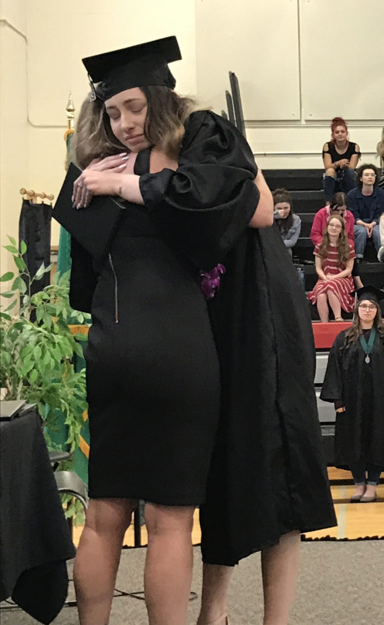 (Photo by Doug Flanagan/Post-Record)
Hayes Freedom High School (HFHS) graduate Darian Holmes hugs her mother Amy Holmes, the school’s principal, after receiving a diploma Saturday during the HFHS graduation ceremony at Liberty Middle School.