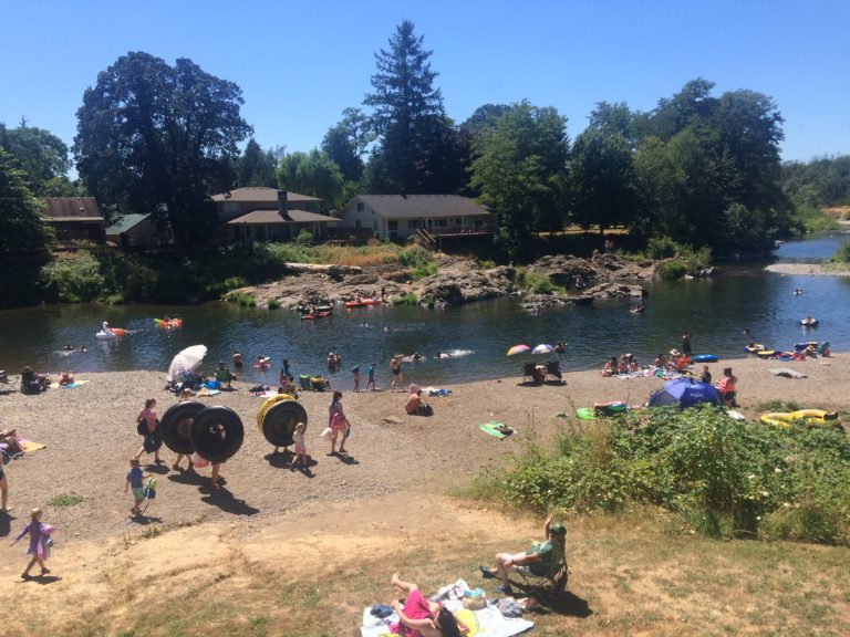 Crowds cool off at the Sandy Swimming Hole in Washougal in July 2017. The National Weather Service has issued an excessive heat warning for the area this week.