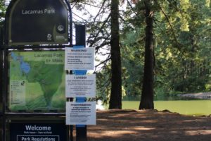 Signs warn against toxic algae at Round Lake in Camas. (Post-Record files)