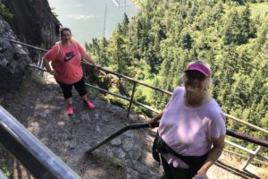 Washougal resident Diana Hooper (right) hikes the Beacon Rock trail with her friend, Teresa Casad (left), on June 30. Hooper has hiked the popular Columbia River Gorge trail more than 50 times.