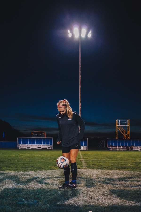 Courtesy Mo Speer 
 Ellie Schmid during a photo shoot at Luther College in Iowa where she played in 2017. (Photo courtesy of Clark College)