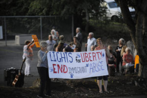 At least 125 people gathered outside the Camas Friends Church in downtown Camas on Friday, July 12, for a vigil addressing abuses against migrant families in government-run detention centers on the southern United States border. (Photos by Wayne Havrelly/Post-Record)